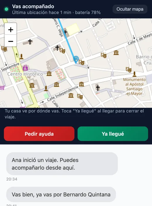 Viaje en curso en el chat de la casa, con el mapa y los botones de pedir ayuda y Ya llegué